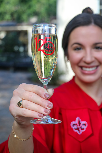 Champagne flute with the University's 125 celebration logo etched onto the glass