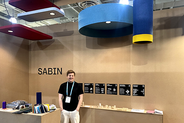 Picture of Sam working a Sabin information booth.