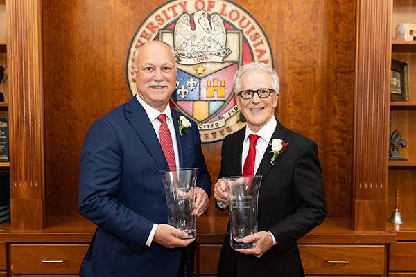 The University of Louisiana at Lafayette Alumni Association honors Joe Lewis (left) and Keith Thibodeaux with the 2024 Outstanding Alumni Award