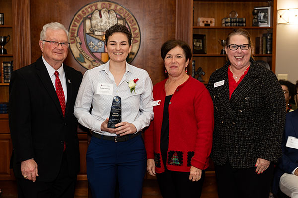 Haley Anslem receives the award for overall Outstanding Master's Graduate in the Fall 2024 semester.